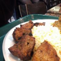 Lamb Kabob · Chunks of tenderloin lamb marinated in our special seasoning. Served with homemade naan (tan...