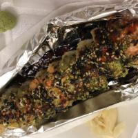 Love Fire Roll · Flaming roll in: shrimp tempura, spicy tuna, crab out: shrimp, avocado.