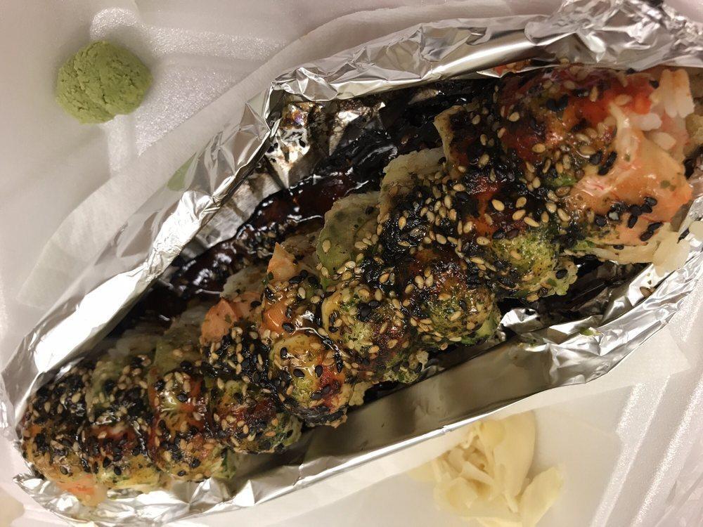 Love Fire Roll · Flaming roll in: shrimp tempura, spicy tuna, crab out: shrimp, avocado.