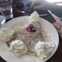 Mixed Berry Crepe · Topped with powdered sugar, whipped cream and syrup.