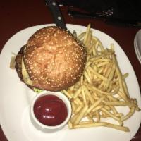 Lamb Burger · Mama lil’s peppers, romaine lettuce, harissa aioli, fries. Add smoked gouda for an additiona...