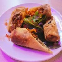 Pulled Pork Spring Rolls · House-smoked pulled pork and fresh vegetables in a crispy egg roll with sweet chili sauce.  ...