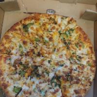 Indian Style Pizza · Marinara, Indian cheese, cheddar cheese, onion, green pepper, Serrano chili, cilantro and ch...