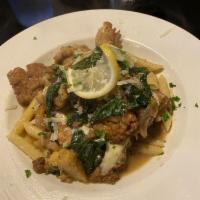 Chicken Tommy · Chicken and artichokes french, spinach, and mozzarella over penne.