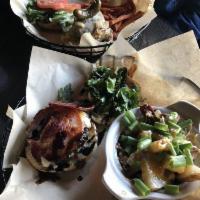 The Angry Goat Burger · 1/2 lb burger, caramelized onions, pancetta, herbed goat cheese, fresh arugula, balsamic gla...