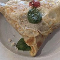 Garden Crepe · Scrambled eggs, baby spinach, mushroom, blistered cherry tomatoes, red onion, roasted red pe...