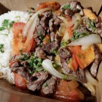 Lomo Saltado · Our top seller sirloin beef strips sauteed with onions, tomatoes delicious traditional 