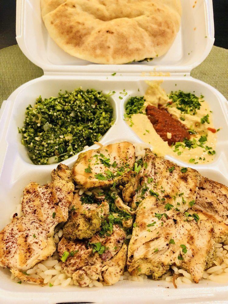 Lemon Chicken Plate · Pieces of chicken breast come with,lemon-flavored sauce. Served with pita and hummus.and salad