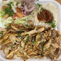 Chicken Shawarma Plate · Grilled chicken Shawarma Served with pita and hummus. And salad and rice or frys