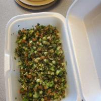 Tabouli · Arabic salad, Quinoa, tomato, onions,cucumber, lemon juice, extra virgin olive oil and grace...