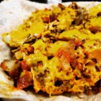 Chorizo Skillet · Scrambled eggs, jalapeno, tomato, onion, chorizo, and salsa.
Served over cherry pit potatoes...