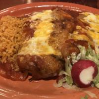 Two Chile Rellenos · Two Anaheim chiles, stuffed with mixed cheese and fried in egg batter, served with Spanish r...