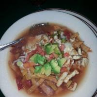 Tortilla Soup · A traditional soup with chicken breast and avocados seasoned with green onions, topped with ...