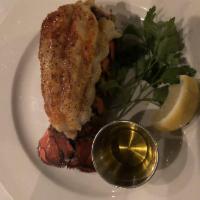 Grilled Lobster Tail · served with drawn butter.