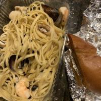 Seafood Pasta · Linguini with shrimps, scallops, calamari, clams, mussels and basil in red marinara or white...