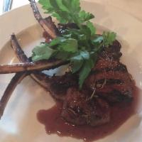 Lamb Chops · Grilled and topped with wine reduction sauce.