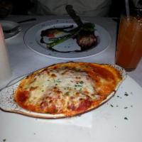 Meat Lasagna · House made 3 cheese lasagna served with sunday sauce.
