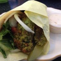 Falafel Sandwich Excellent · Spiced garbanzo beans, bulgur wheat, parsley, onions, herbs, tahini sauce, lettuce and tomat...