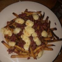 Irish Poutine · French fries, cheese curds, beer braised corned beef and onion gravy