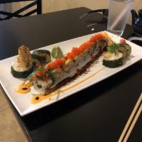 Dragon Roll · Eel with tempura shrimp and avocado. Topped with spicy mayo cooked.