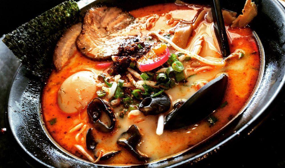 Tonkotsu Ramen · Roasted pork, boiled egg, kikurage mushroom, bamboo shoots, green onion, sprouts and fish cake.