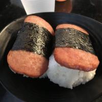 2 Piece Spam Musubi · Rice and spam wrapped tightly around with seaweed with sauce inside.