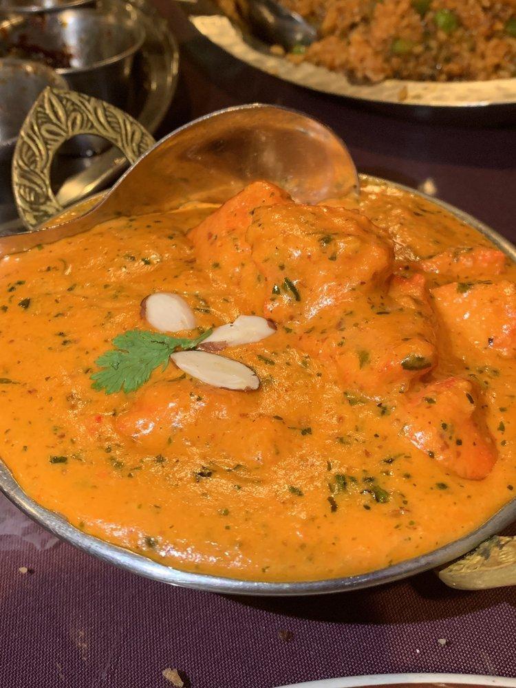 Chicken Tikka Masala · Chicken breast chunks in herbs and spices with cream. A specialty of the house.