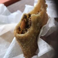 Beef Empanada · Fresh cook ground beef with onions, green bell peppers and house seasoning.