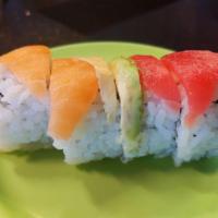 Rainbow Roll · Whole roll. California roll base with raw salmon, raw tuna, and avocado on top. 8 pieces.