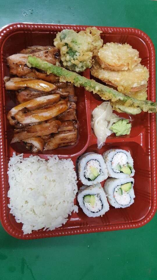 Bento Box · Chicken Teriyaki, 4 pieces of california roll, 3 pieces of gyoza, 1 piece of egg roll, salad, and steamed rice