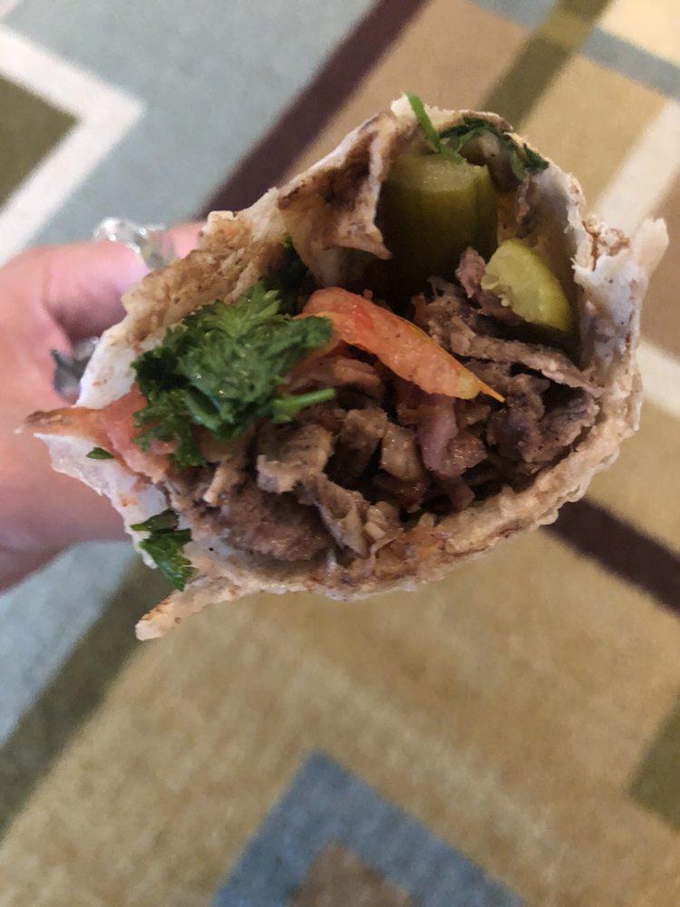 Beef Shawarma · Beef, lettuce, pickles, parsley, onion with sumac, and tahini.
