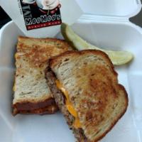 Moo Melt · On grilled rye bread, American, and Swiss cheese, moo sauce and grilled onions.