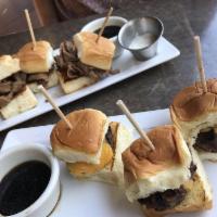Cheeseburger Slider · American cheese, caramelized onions and au jus.