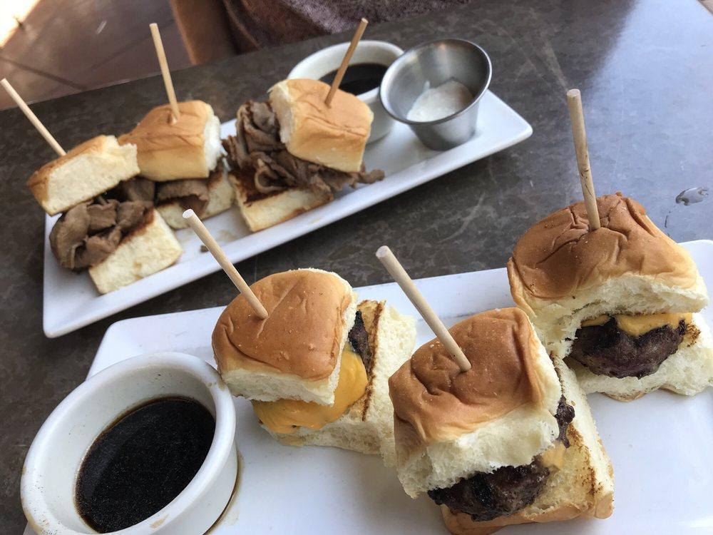 Cheeseburger Slider · American cheese, caramelized onions and au jus.
