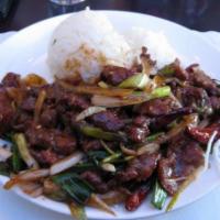 Mongolian Beef · Onions, scallions and crispy rice noodles. Medium spicy.
