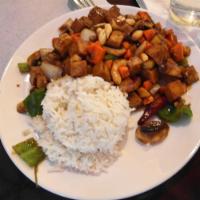 Kung Pao Chicken · Mushrooms, celery, carrots, bamboo shoots, bell peppers, onions and peanuts. Medium spicy.