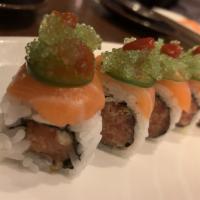Kiss of Fire Roll · Salmon, albacore tuna, jalapeño and wasabi tobiko caviar, wrapped around crunchy spicy tuna ...