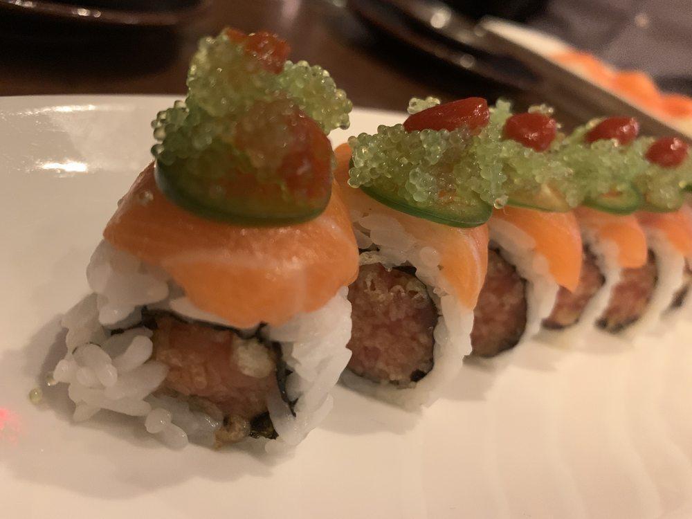 Kiss of Fire Roll · Salmon, albacore tuna, jalapeño and wasabi tobiko caviar, wrapped around crunchy spicy tuna and jalapeño