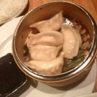 King Crab Dumplings · Steamed and with spicy soy vinaigrette.