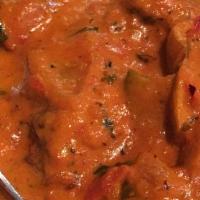 Chicken Tikka Masala · Charcoal cooked pieces of chicken in special creamy sauce.