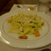 Classic Caesar Salad · Spicy croutons and Parmesan cheese.