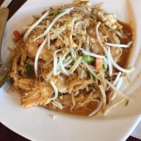 Pad Thai · Thai rice noodles stir-fried with egg, bean sprouts, green onions, ground peanut, and bean c...