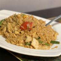 Spicy Basil Fried Rice Dish · Spicy  Stir-fried jasmine rice, egg, basil leaves, string bean and bell pepper in spicy chil...