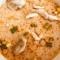 Tom Kha · Coconut milk soup with galanga root, kaffir lime, lemongrass, mushroom, and cilantro.