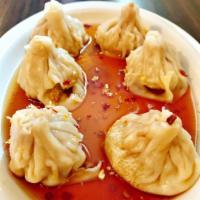 Dumplings · 6 pieces. Minced pork with yellow onion, water chestnut and garlic, wrapped in wonton skin, ...