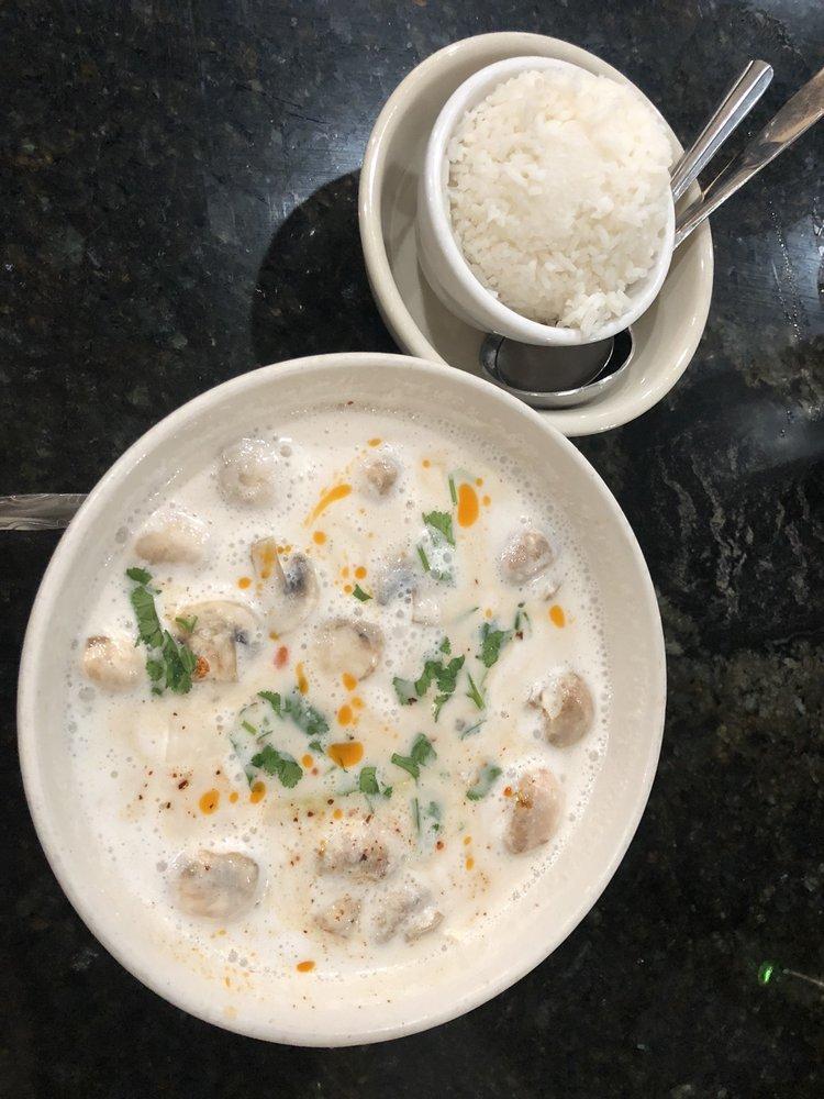 Tom Kha Gai Soup · Creamy coconut milk soup with chicken, yellow and green onions, galangal, mushrooms, lemongrass, cilantro and kaffir leaves, spiced with Thai chili and lime juice.