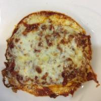 Manicotti · Crepes stuffed with ricotta cheese in a meat or marinara sauce and topped with mozzarella ch...