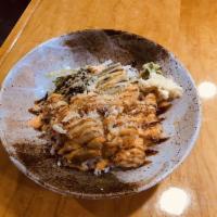 Poke Bowl · Fresh tuna, salmon, avocado, cucumber kizami nori, masago  with Japanese dressing sauce & sp...