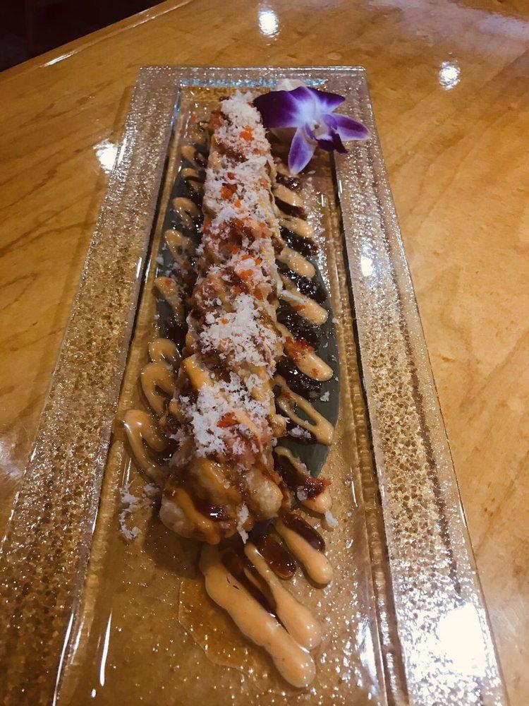 King Crunchy Roll · White tuna, avocado, spicy crabmeat salad inside deep fried, with spicy tuna, crunchy & masago on top, served with eel sauce & spicy mayo, ponzu