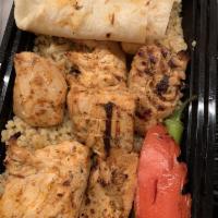 Chicken Shish · Marinated cubes of chicken grilled on skewer served with house salad and your choice of rice...